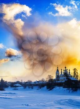 Vertical burning sunset near Russian churches background backdrop