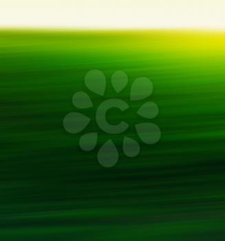 Vertical green yellow sunny field abstract backdrop