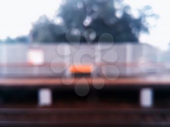 Horizontal railway station with bench bokeh background hd