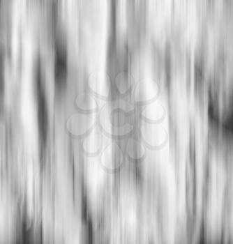 Vertical black and white falling snow in motion abstraction background backdrop