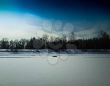 Man resting on frozen river landscape background hd
