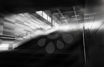 Black and white metro upstairs with light rays background hd
