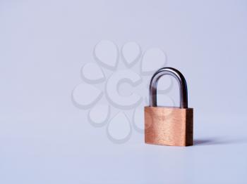 Securely locked lock on white background