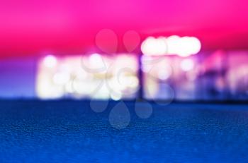 Pink and blue surface night bokeh background