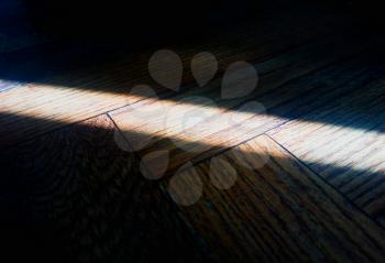 Diagonal light ray on floor texture background