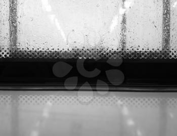 Black and white rainy window in bus background
