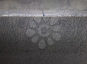 Black and white edge of sidewalk pavement texture background