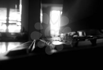 Black and white office keyboard closeup bokeh background