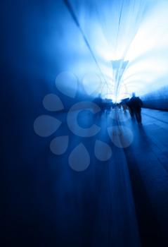 Man walking in Moscow metro blue background