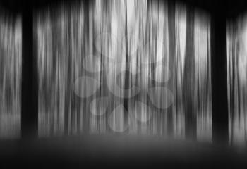 Vertical black and white motion blur pillars background