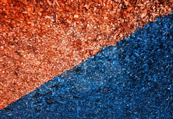 Diagonal orange and navy blue sawdust minimal texture background