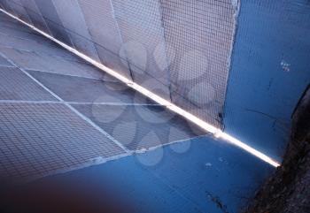 Diagonal light from crack concrete texture background