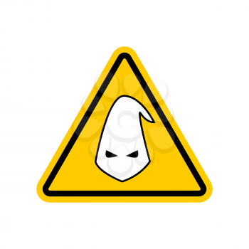 Attention nationalism. Danger of racism yellow road sign. Ku Klux Klan Caution!
