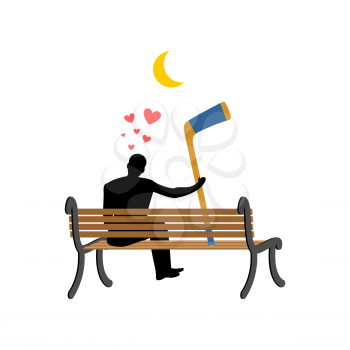 Lover hockey. Man and hockey stick sitting on bench. Romantic date. I love sports
