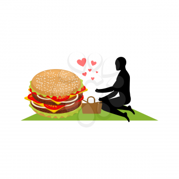 lover fast food. Man and hamburger on picnic. Guy and Burger. Meal in nature. blanket and basket for food on lawnt. Romantic date fastfood. Glutton Lifestyle