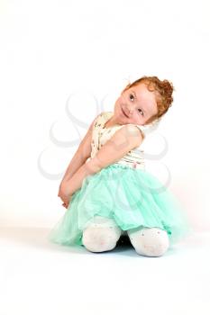 Fashion little girl in green dress, in catwalk model pose, stock photo. Image 07