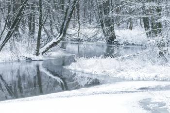 Winter landscape with small river