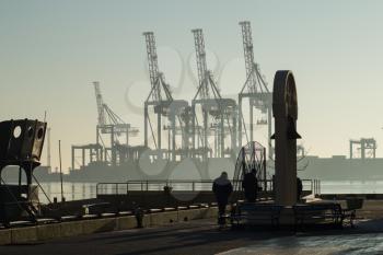 Winter Morning at the Cargo Port. Container cranes.