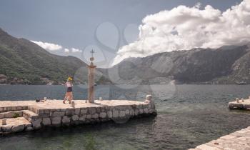 Perast, Montenegro - 07.11.2018.  Pier on the island near the old church in the Bay of Kotor, Montenegro