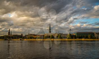 Panorama of Old Riga city at sunset. View from the Daugava river