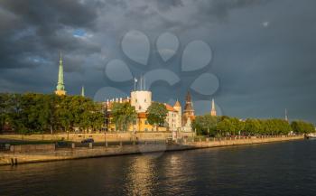 Fantastic view of the Riga Castle from the riverside in a summer evening