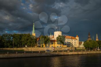 Fantastic view of the Riga Castle from the riverside in a summer evening