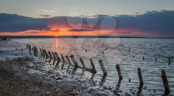 Sunset on the salty estuary Kuyalnik,  dead lake near Odessa, Ukraine