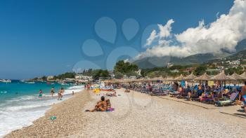 Dhermi, Albania - 07.08.2018. People relaxing in the resort Dhermi in Albania on a sunny summer day