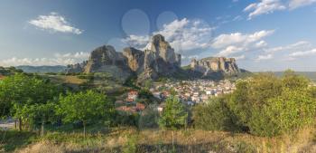 Panoramic view of the Kalambaka town at the foot of the Meteora Mountains in Greece on a sunny summer day