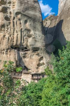 Monastic cave hermit monks houses and rock formation in Meteora near Trikala, Greece.