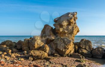 Huge stone by the sea on a Sunny autumn day on the seashore near the village of Fontanka, Odessa region, Ukraine