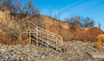 Old wooden stairs down to the sea near the village of Fontanka, Odessa region, Ukraine