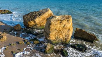 Few limestone stones on a Sunny autumn day on the seashore near the village of Fontanka, Odessa region, Ukraine
