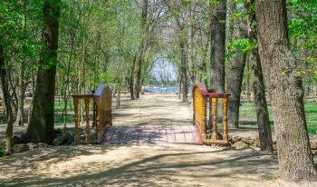 Askania-Nova, Ukraine - 04.28.2019. Alleys on the territory of Askania-Nova nature reserve in Ukraine on a sunny spring day