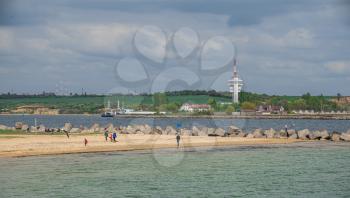 Grigoryevka, Ukraine - 05.09.2019. The lighthouse at the entrance to Adzhalyk estuary from the Black Sea. Sea gate to the South Trade Port in Ukraine