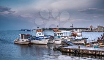 Nessebar, Bulgaria – 07.10.2019.  Pleasure boats at the pier of the old town of Nessebar in Bulgaria on a summer morning