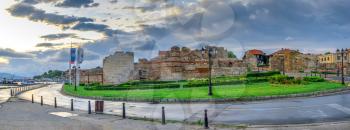 Nessebar, Bulgaria – 07.10.2019.  The ruins of the fortress wall and tower of the old town of Nessebar in Bulgaria on a summer morning