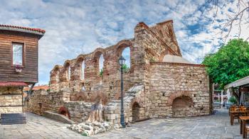 Nessebar, Bulgaria – 07.10.2019.  Ruins of the Saint Sophia Metropolitan church in the old town of Nessebar, Bulgaria, on a cloudy summer morning