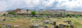 The ruins of the ancient city of Hierapolis in Pamukkale, Turkey, on a sunny summer day