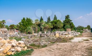 The ruins of the ancient city of Hierapolis in Pamukkale, Turkey, on a sunny summer day