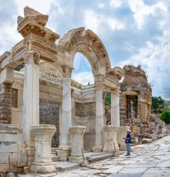 Ephesus, Turkey – 07.17.2019.Temple of Hadrian ruins in antique Ephesus city, Turkey, on a sunny summer day