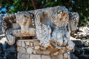 Sculptures and details of the columns of the Temple of Apollo at Didyma, Turkey, on a sunny summer day