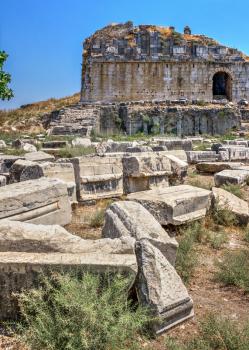 Huge stone blocks of the Ancient Theatre in the greek city of Miletus in Turkey on a sunny summer day