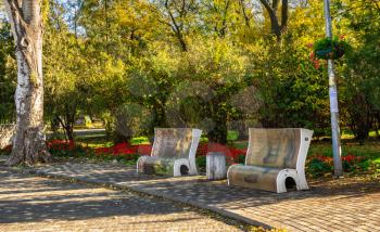 Odessa, Ukraine 11.05.2019.  Artistically designed street benches in Shevchenko Park in Odessa, Ukraine, on a sunny autumn day