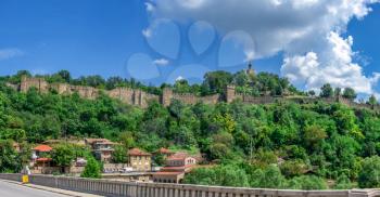 Tsarevets fortress with the Patriarchal Cathedral of the Holy Ascension of God in Veliko Tarnovo, Bulgaria. Big size panoramic view on a sunny summer day