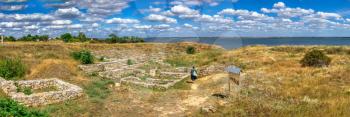 Ancient greek colony Olbia on the banks of the Southern Bug River in Ukraine on a cloudy summer day. Hi-res panoramic photo.