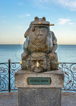 Berdyansk, Ukraine 07.23.2020. Monument to the toad on the embankment of Berdyansk, Ukraine, on an early summer morning