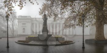 Odessa, Ukraine 11.28.2019.  Monument to Alexander Pushkin on Primorsky Boulevard in Odessa, Ukraine, on a foggy autumn day