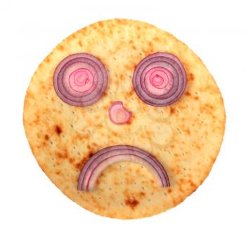 Sad cake face with red onion isolated on white background