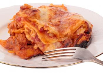 Lasagna in plate isolated on white background